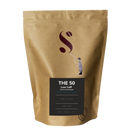 Brown coffee bag with 'S' logo and text on a white background